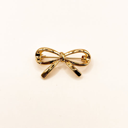 Strikje goud | Broche